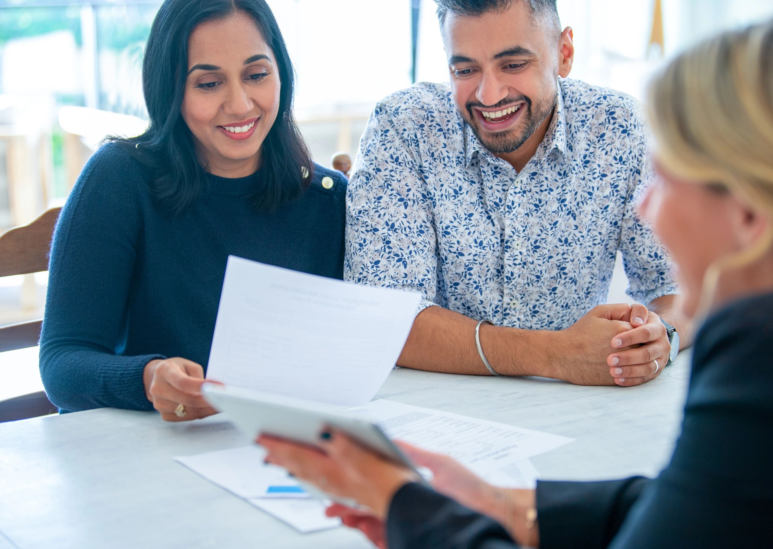 Professional team discussing mortgage options